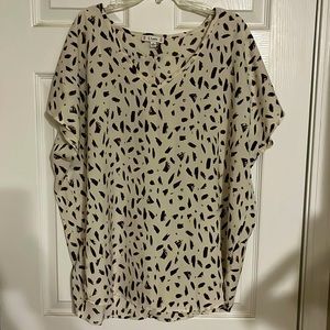 Cream/beige tunic. Size Large